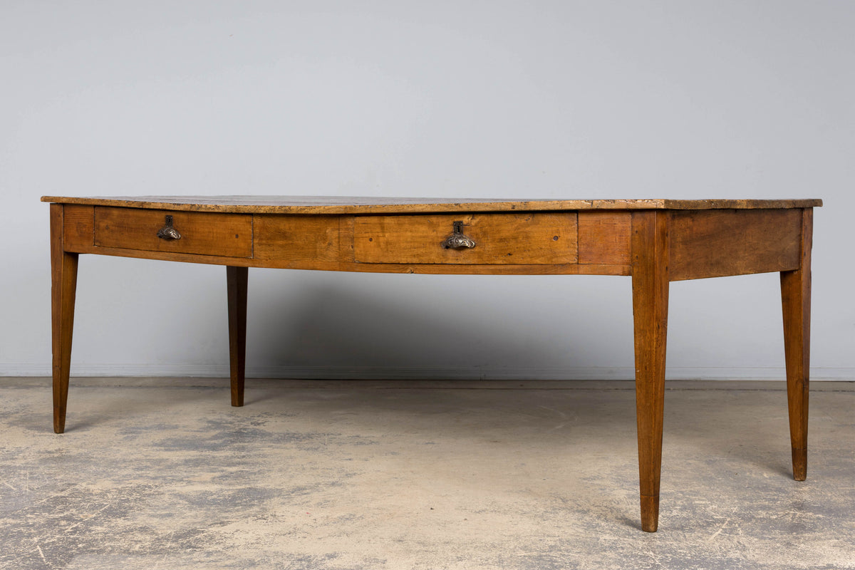 Early 19th Century French Provincial Fruitwood Farmhouse Table with Two Drawers