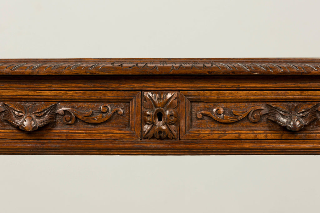 Late 19th Century French Henry II Carved Oak Writing Table
