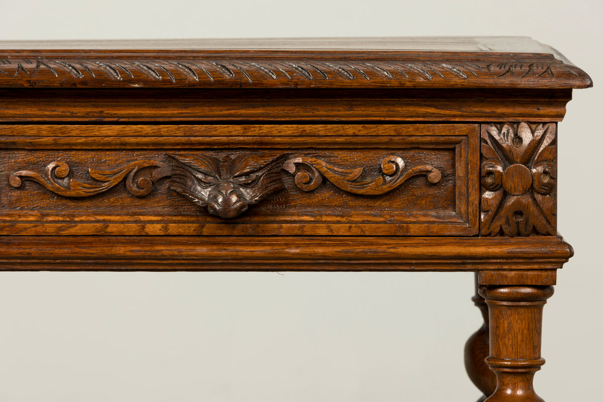 Late 19th Century French Henry II Carved Oak Writing Table