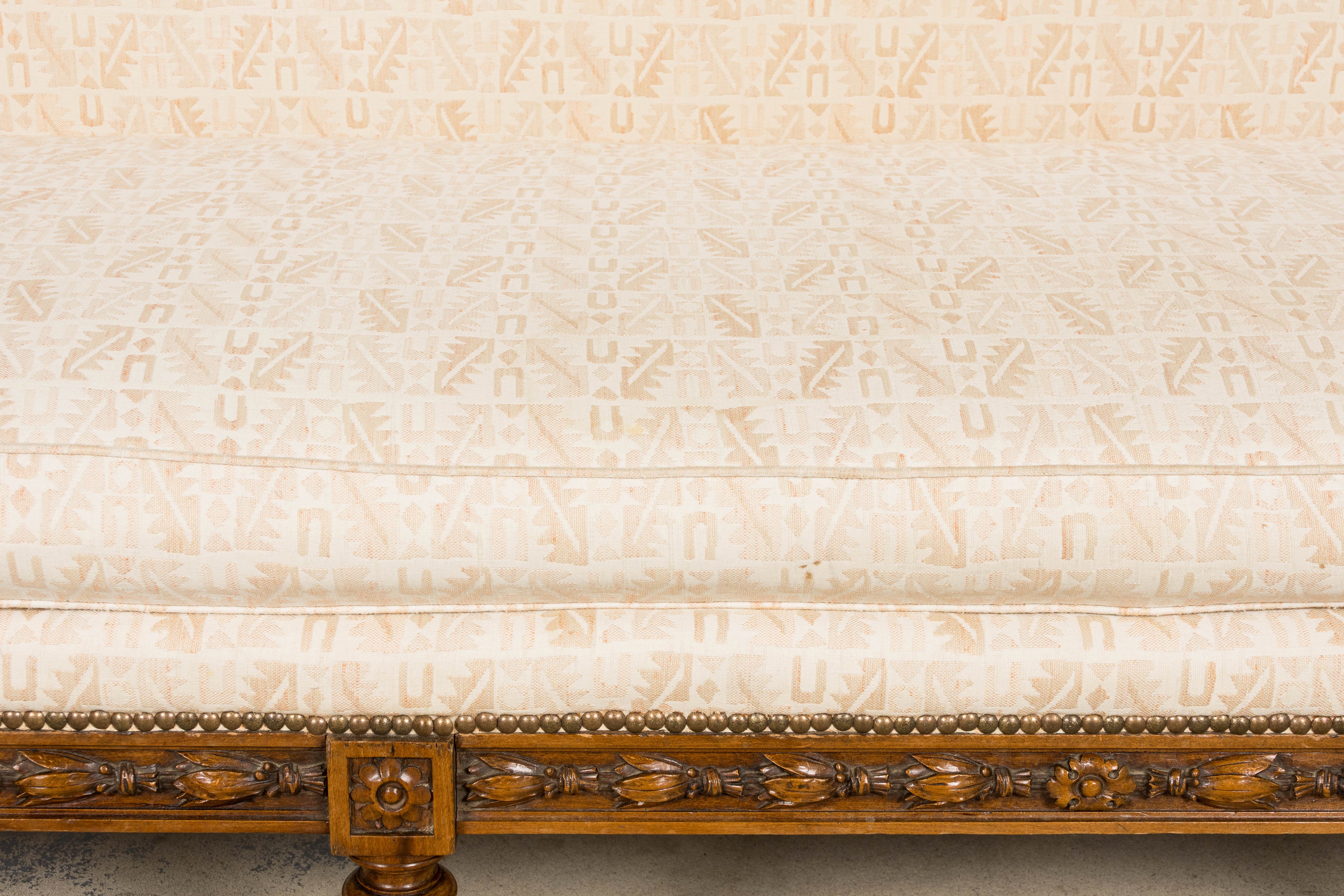 Late 19th Century French Louis XVI Style Oak Canapé in Cream Jacquard