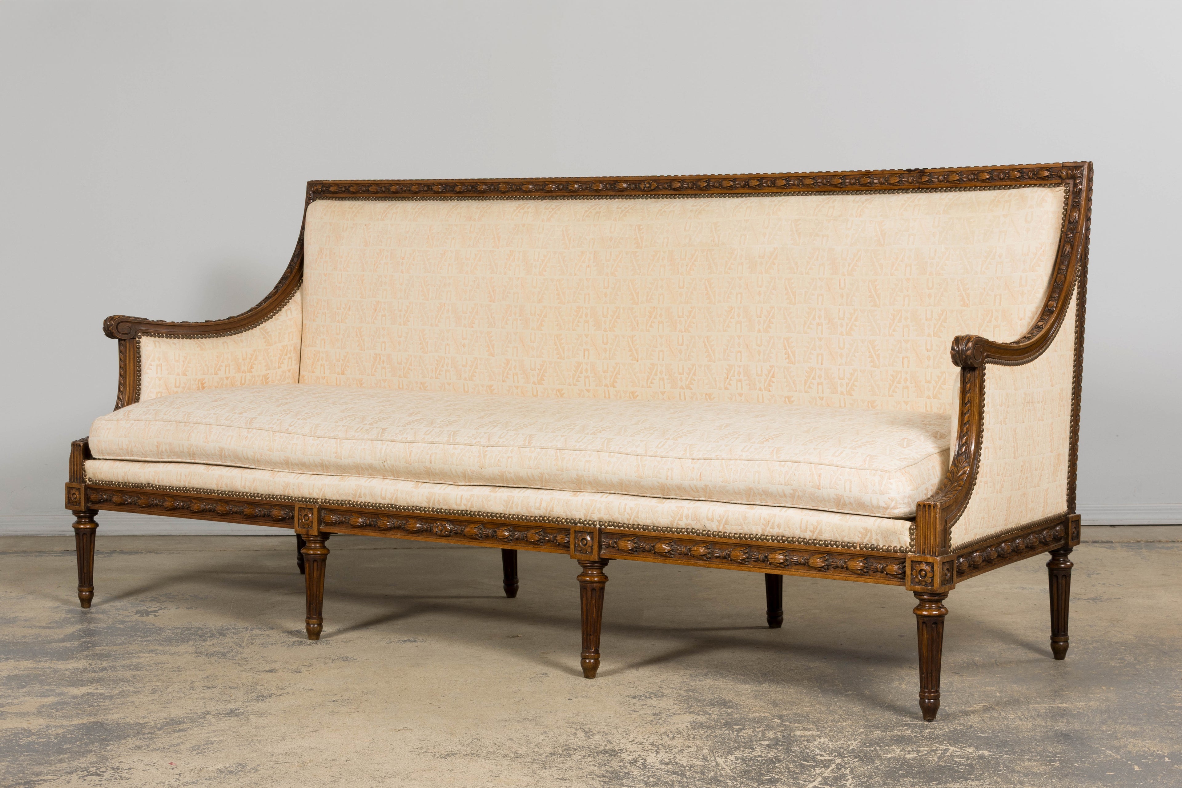 Late 19th Century French Louis XVI Style Oak Canapé in Cream Jacquard