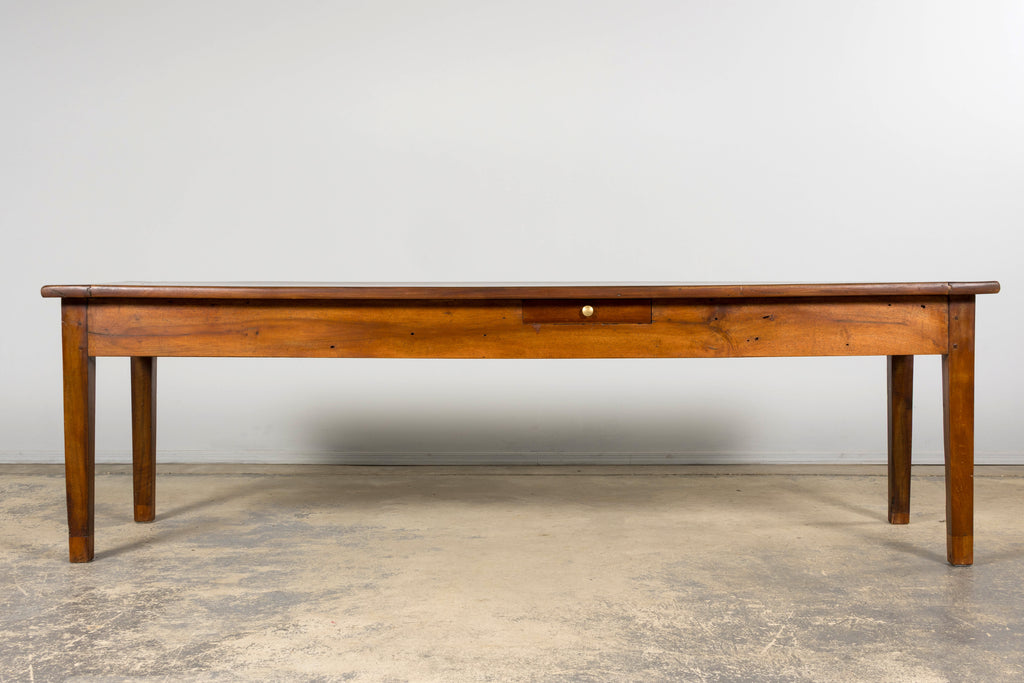 Late 19th Century French Provincial Walnut Farmhouse Table with Four Drawers