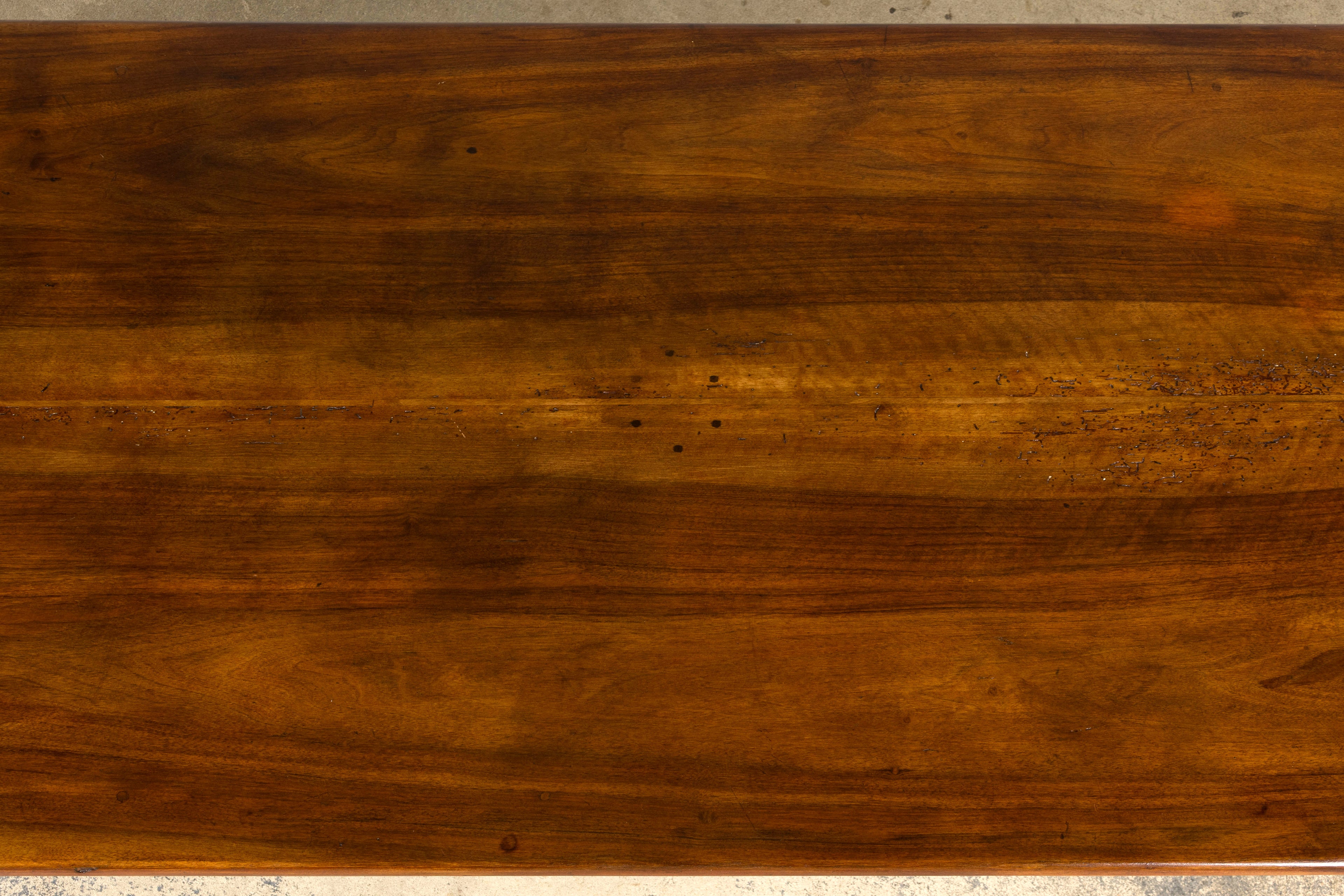 Late 19th Century French Provincial Walnut Farmhouse Table with Four Drawers