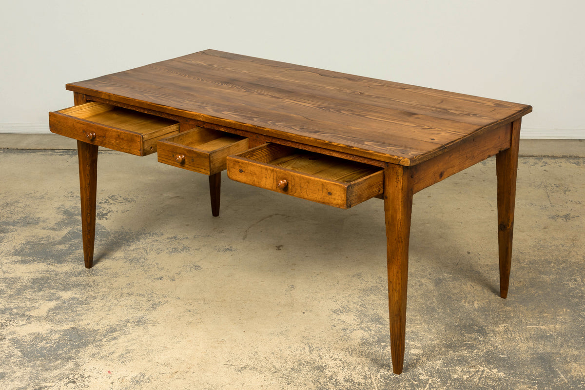 Late 19th Century French Rustic Farmhouse Pine Three-Drawer Writing Table