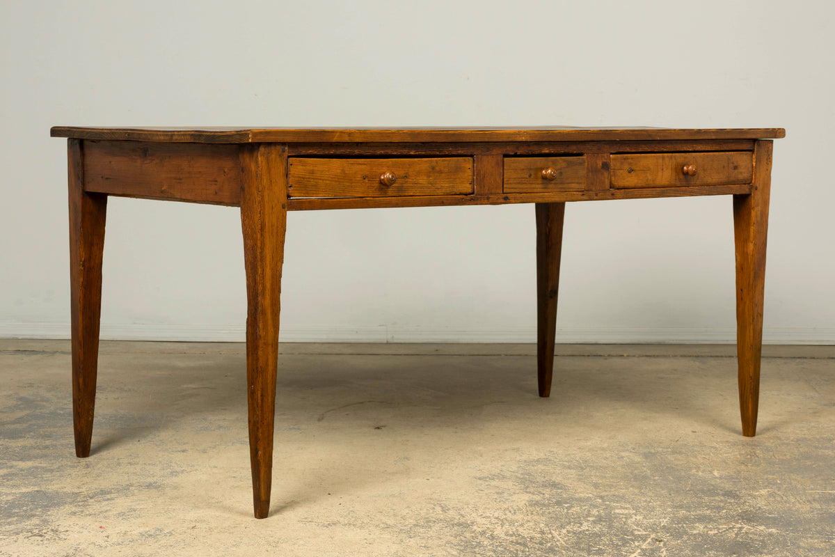 Late 19th Century French Rustic Farmhouse Pine Three-Drawer Writing Table