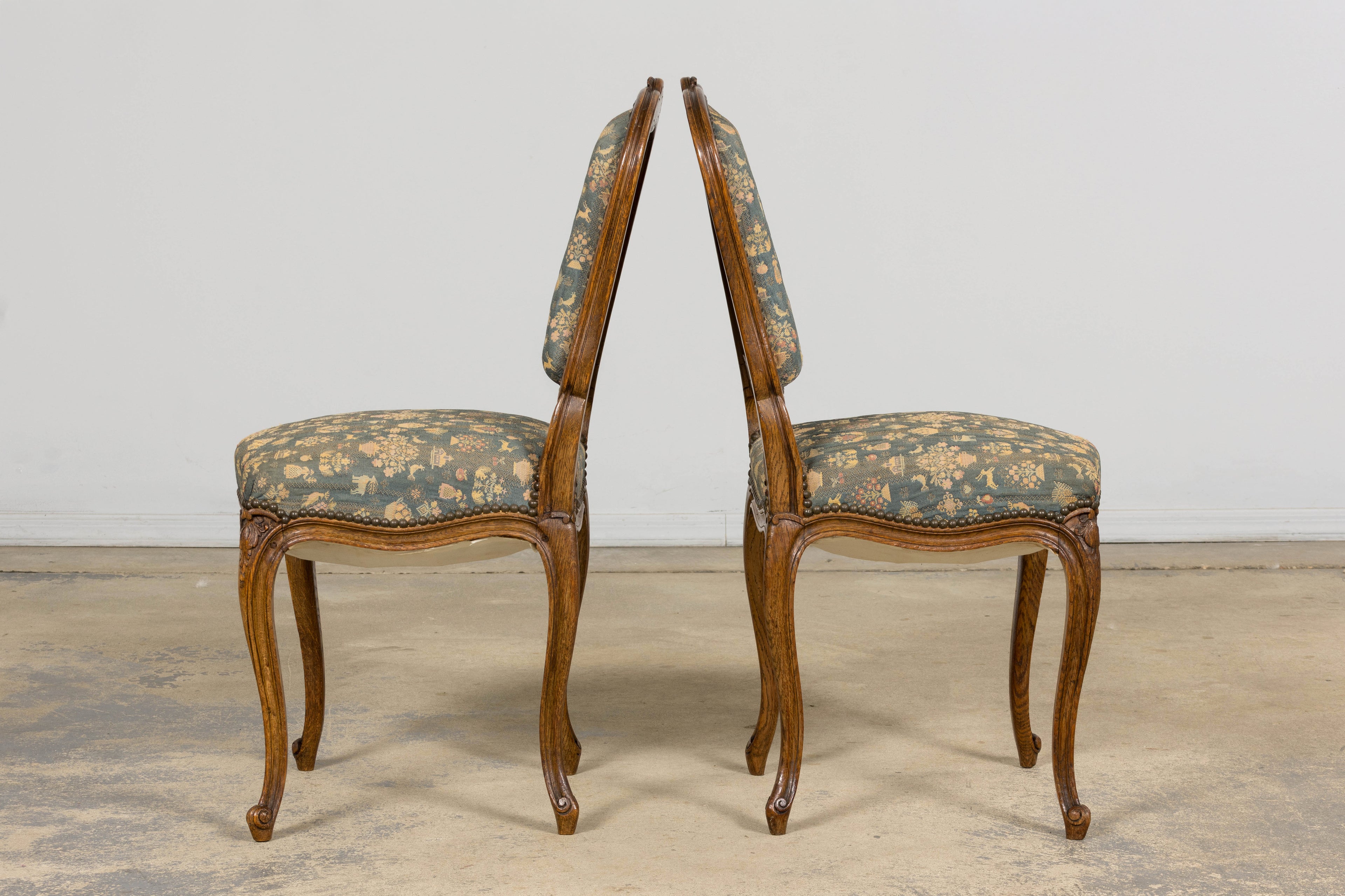 Set of 12 Late 19th Century French Provincial Louis XV Oak Dining Chairs