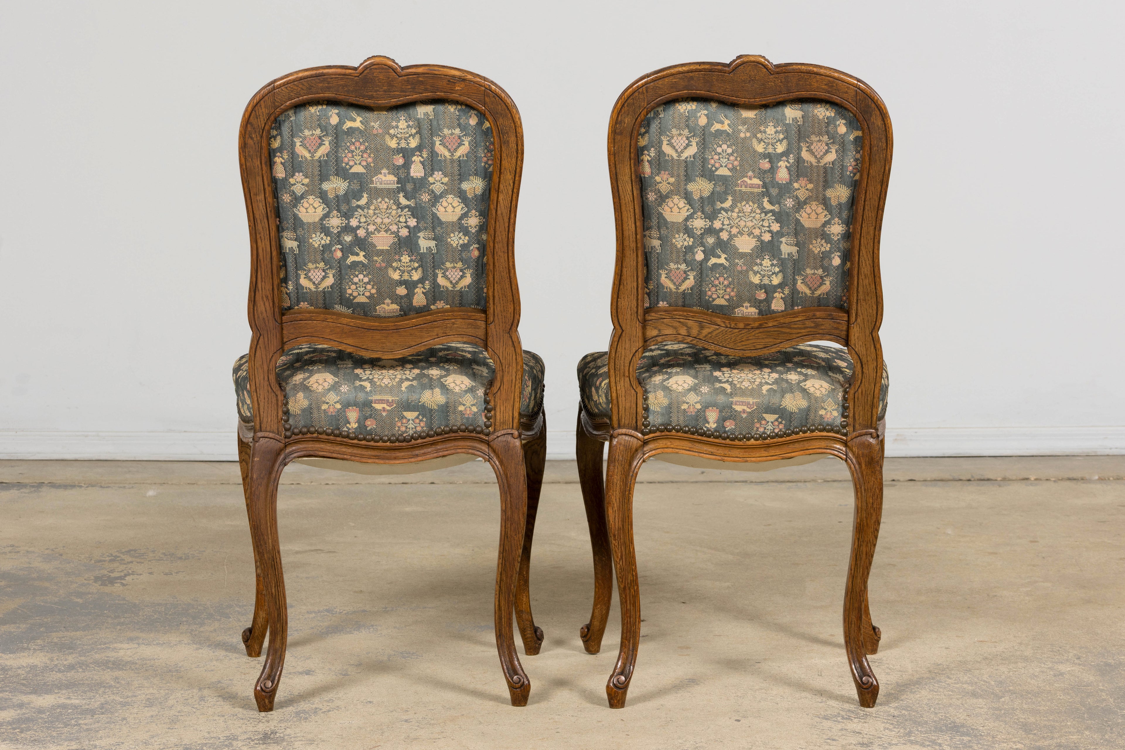 Set of 12 Late 19th Century French Provincial Louis XV Oak Dining Chairs