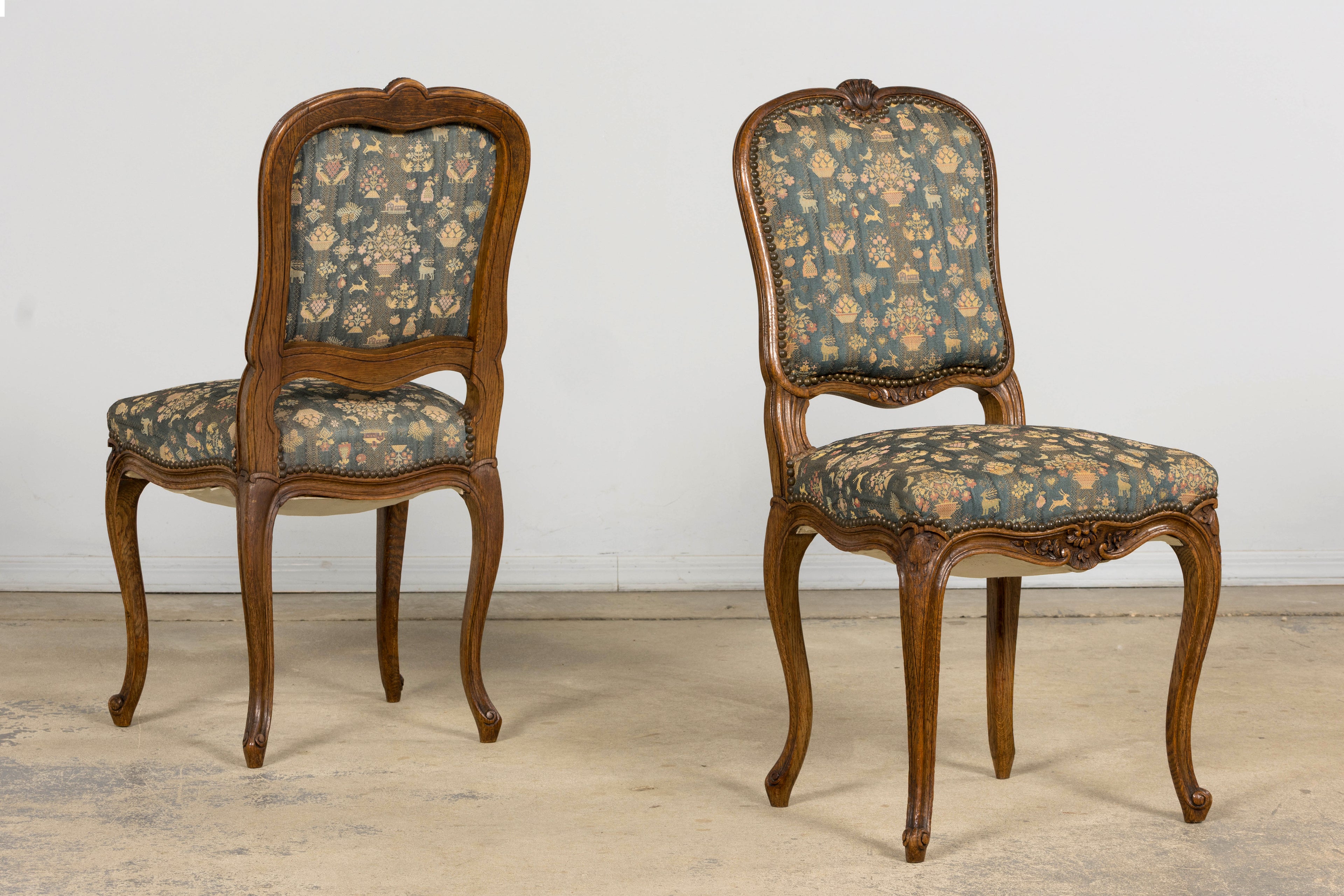 Set of 12 Late 19th Century French Provincial Louis XV Oak Dining Chairs