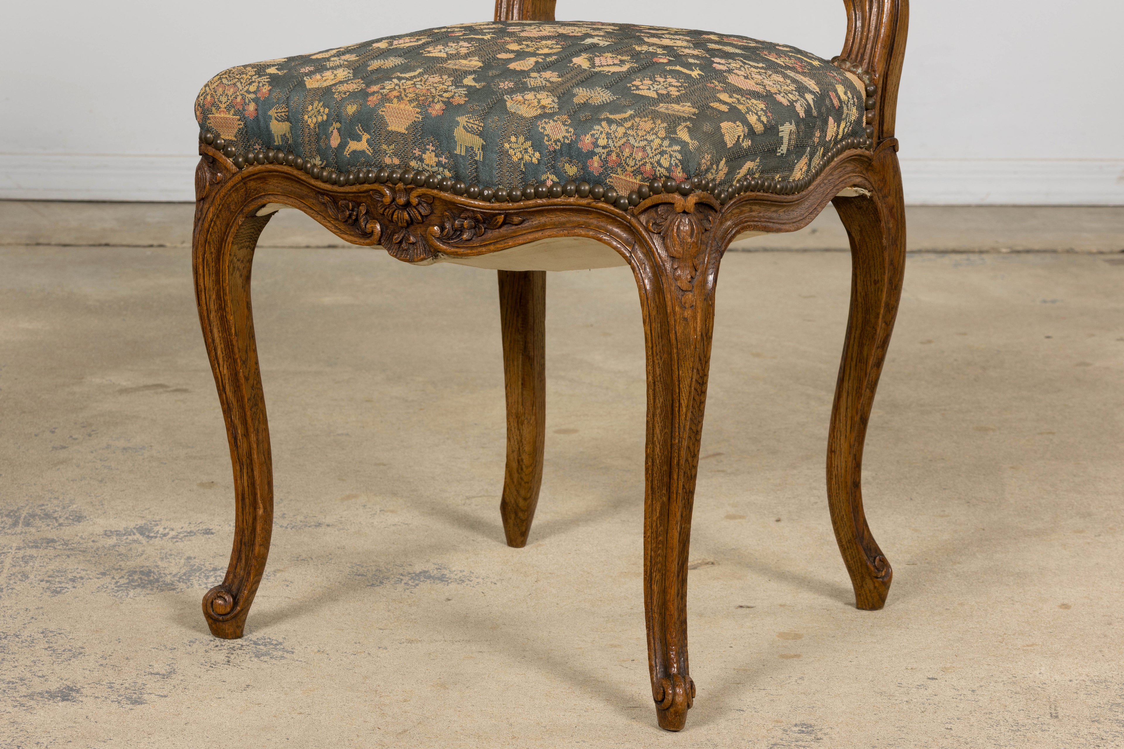 Set of 12 Late 19th Century French Provincial Louis XV Oak Dining Chairs