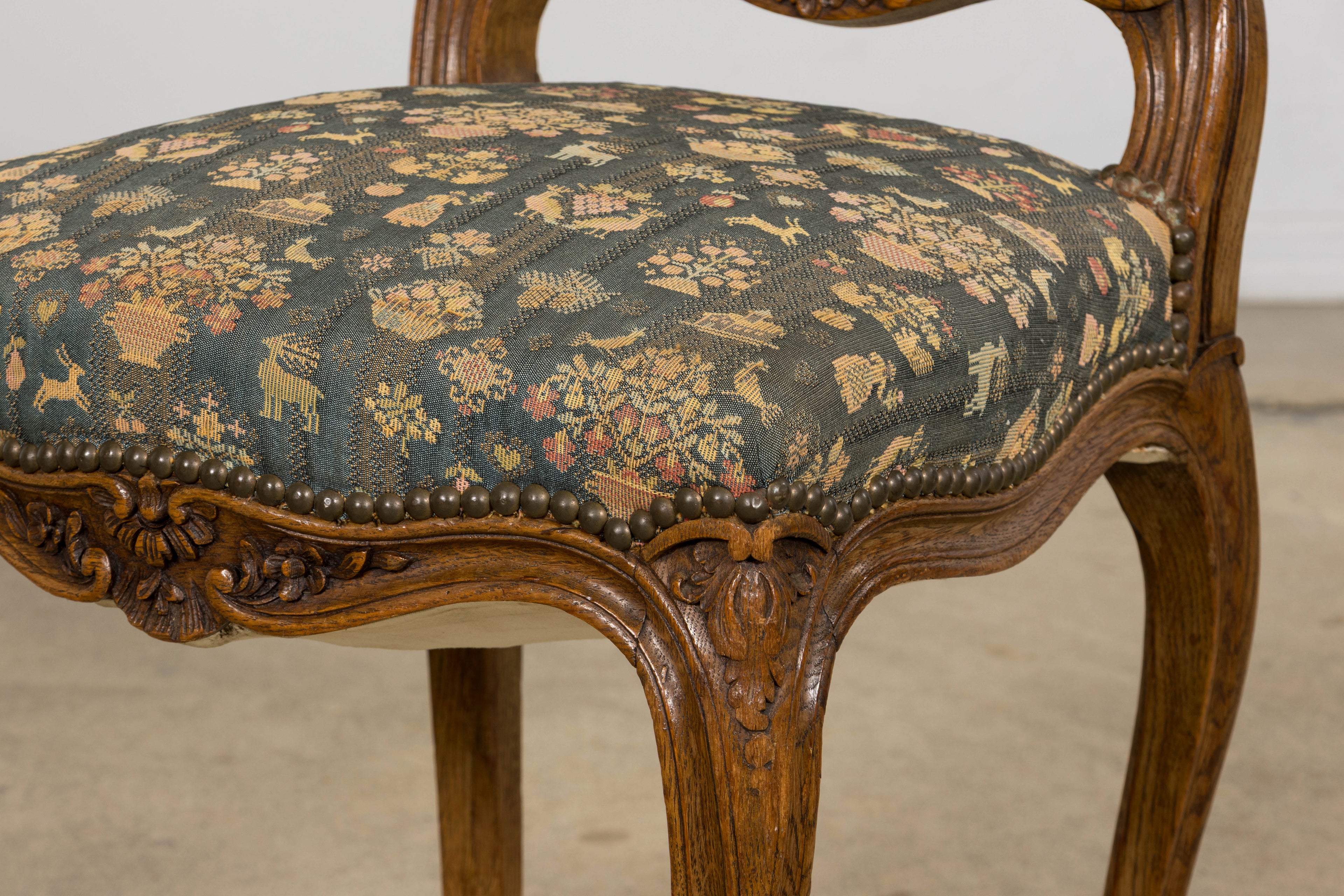 Set of 12 Late 19th Century French Provincial Louis XV Oak Dining Chairs