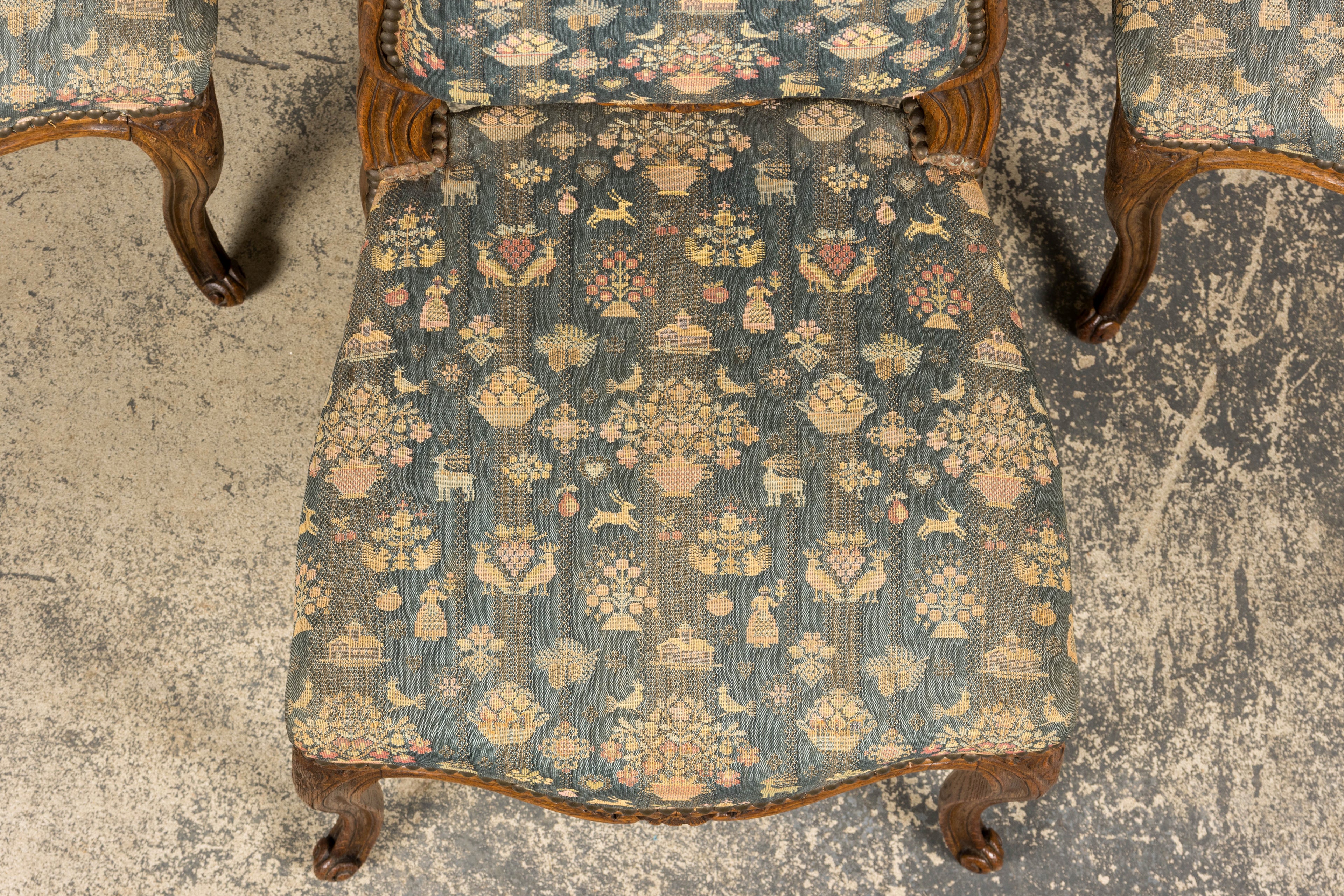 Set of 12 Late 19th Century French Provincial Louis XV Oak Dining Chairs