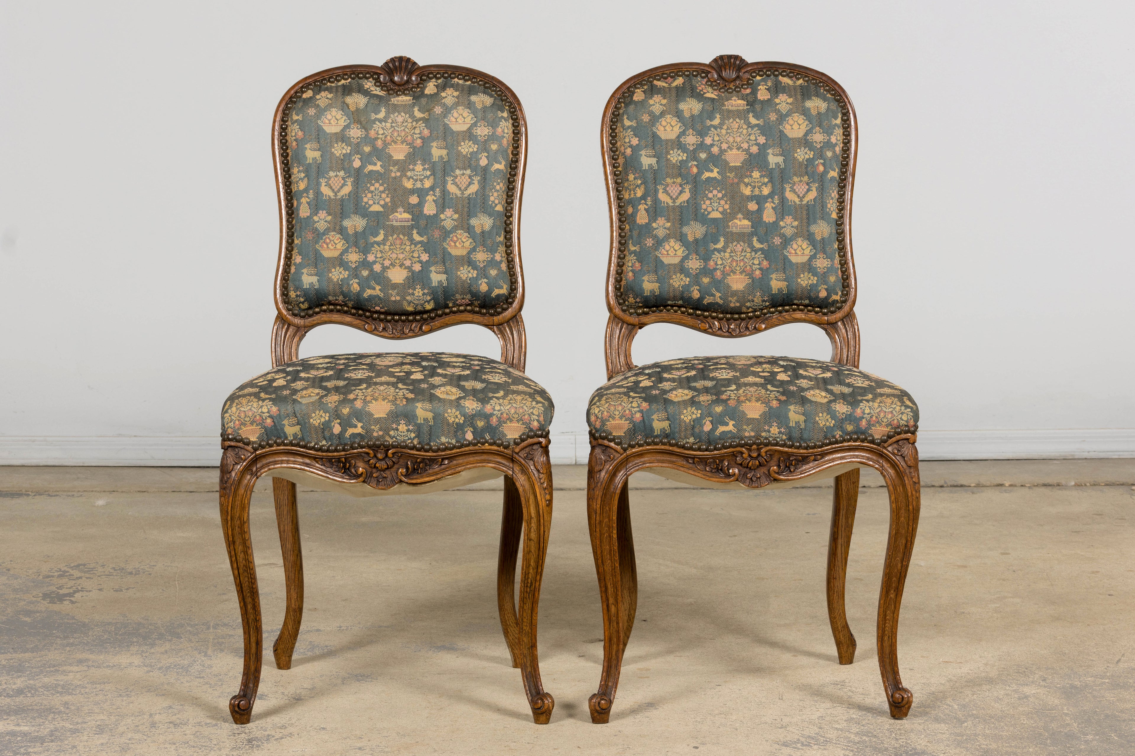 Set of 12 Late 19th Century French Provincial Louis XV Oak Dining Chairs