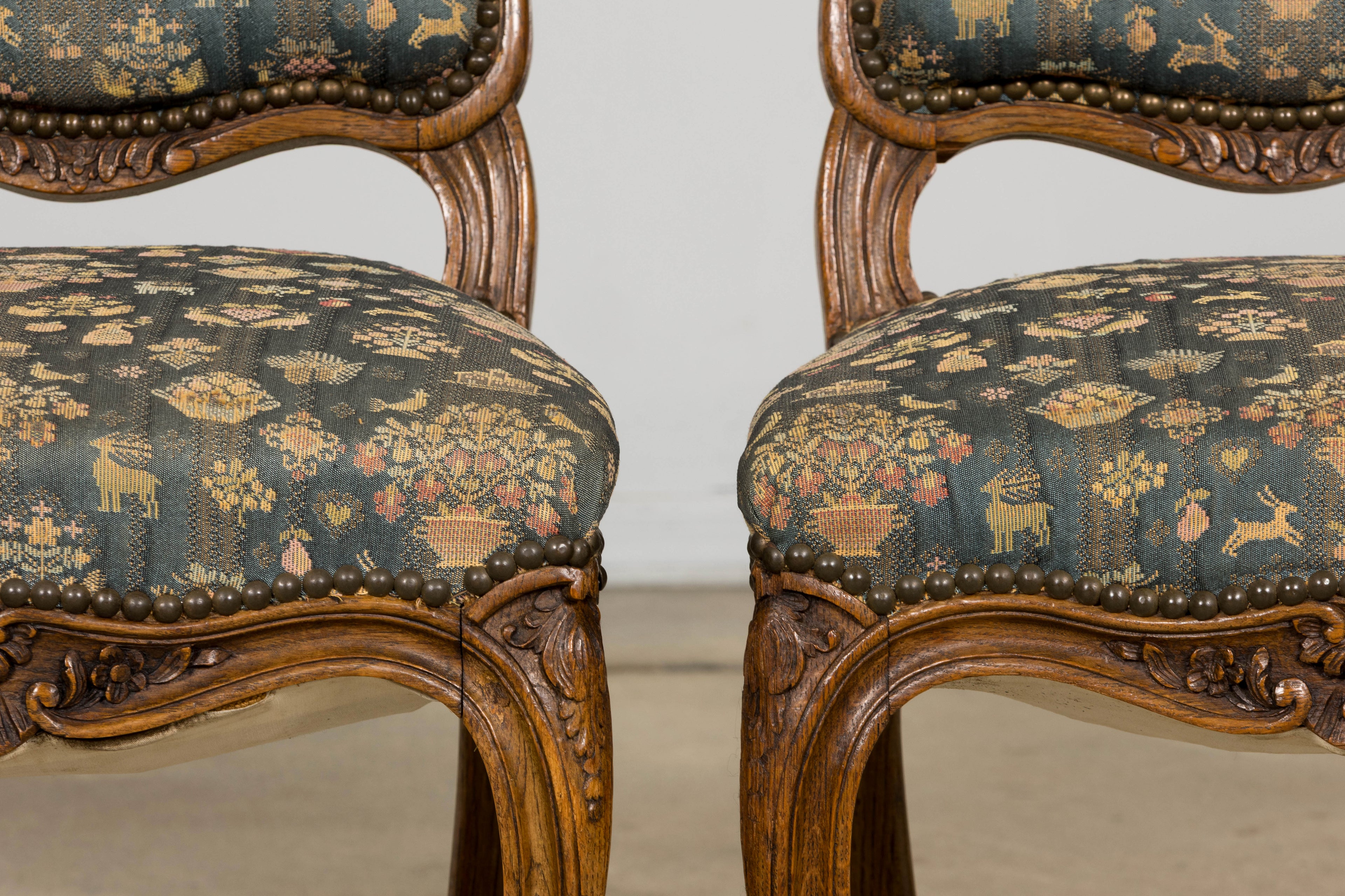 Set of 12 Late 19th Century French Provincial Louis XV Oak Dining Chairs