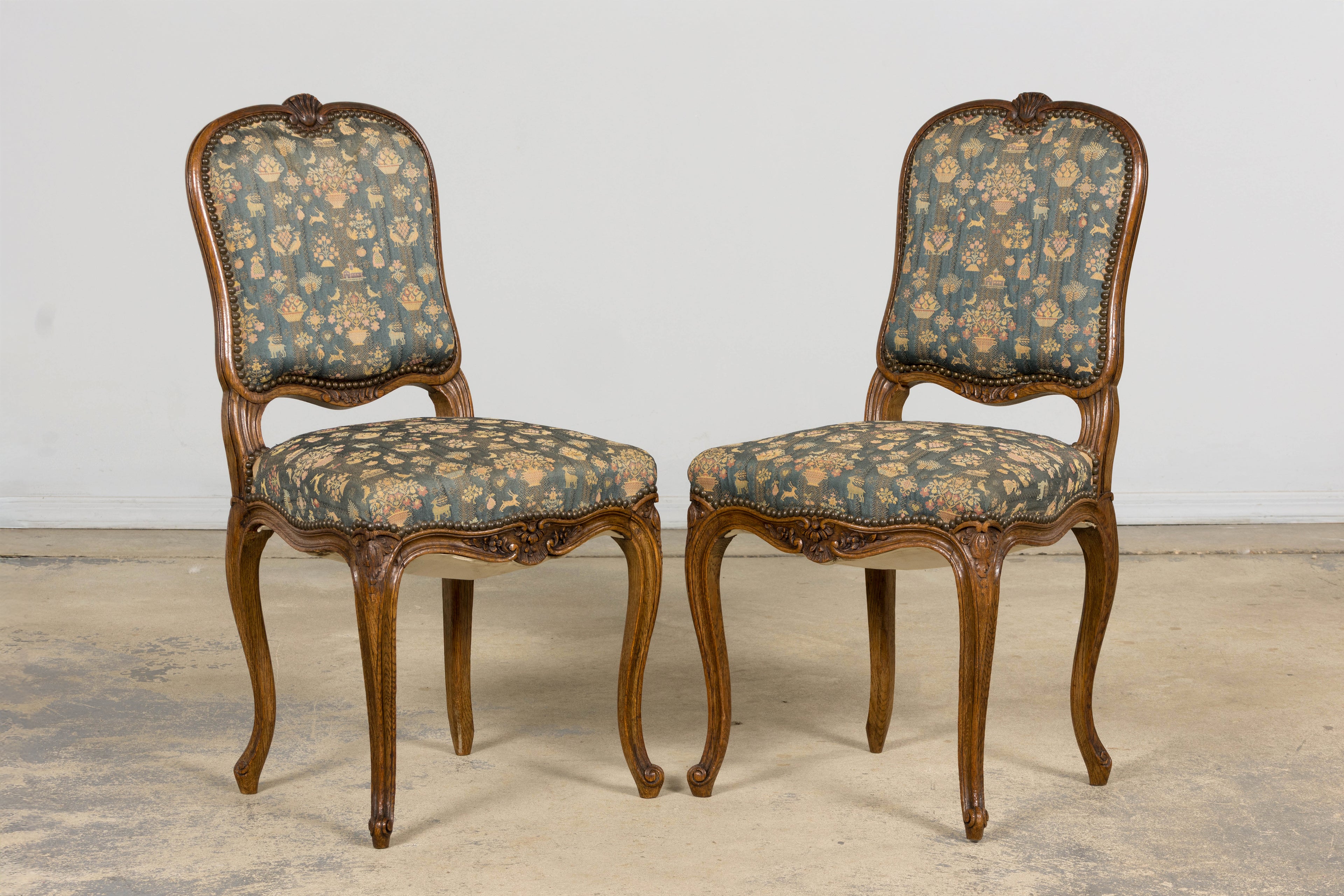 Set of 12 Late 19th Century French Provincial Louis XV Oak Dining Chairs