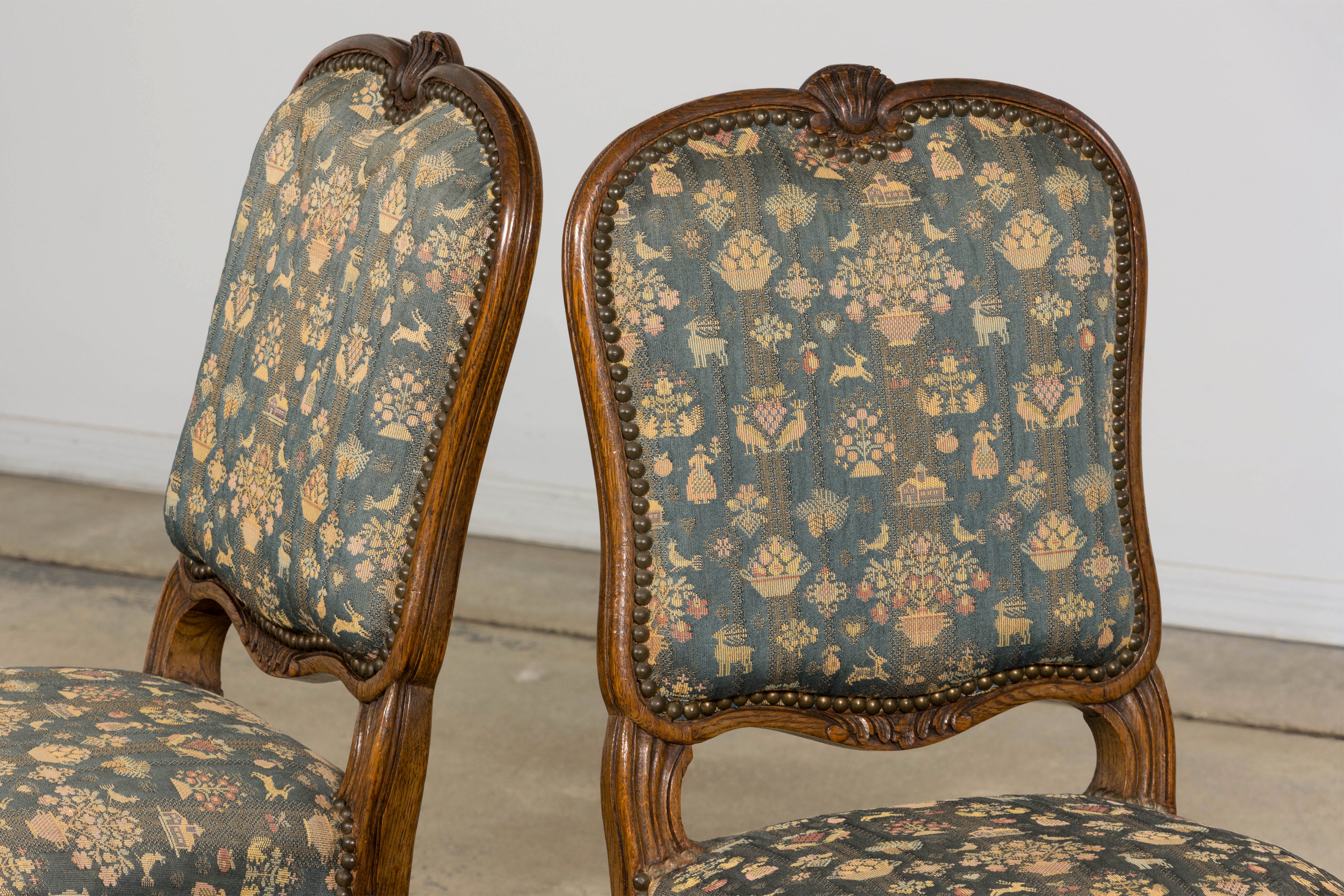 Set of 12 Late 19th Century French Provincial Louis XV Oak Dining Chairs