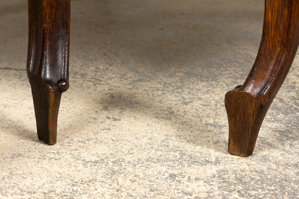 Set of 12 Late 19th Century French Renaissance Revival Carved Oak Dining Chairs with Embossed Leather