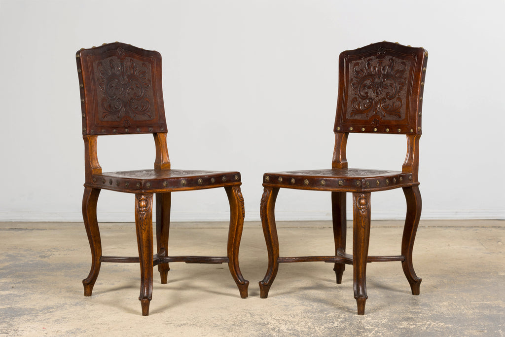 Set of 12 Late 19th Century French Renaissance Revival Carved Oak Dining Chairs with Embossed Leather