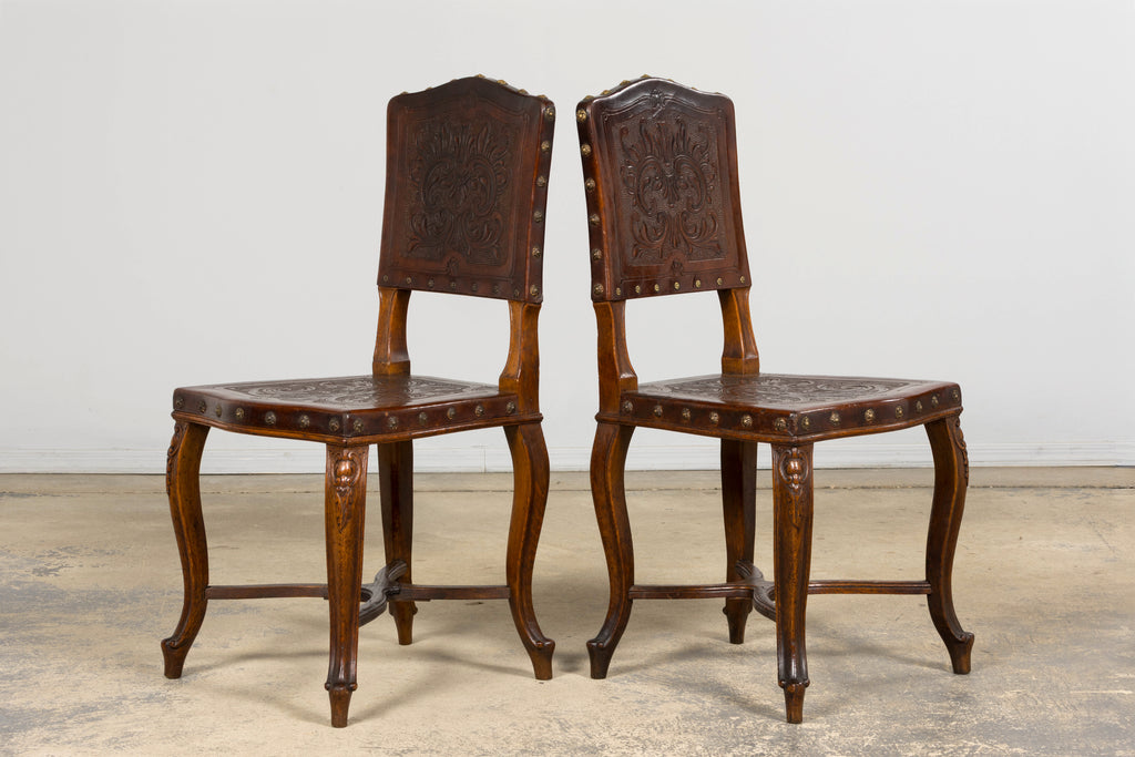 Set of 12 Late 19th Century French Renaissance Revival Carved Oak Dining Chairs with Embossed Leather