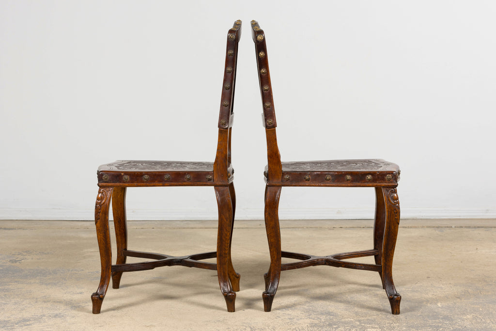 Set of 12 Late 19th Century French Renaissance Revival Carved Oak Dining Chairs with Embossed Leather