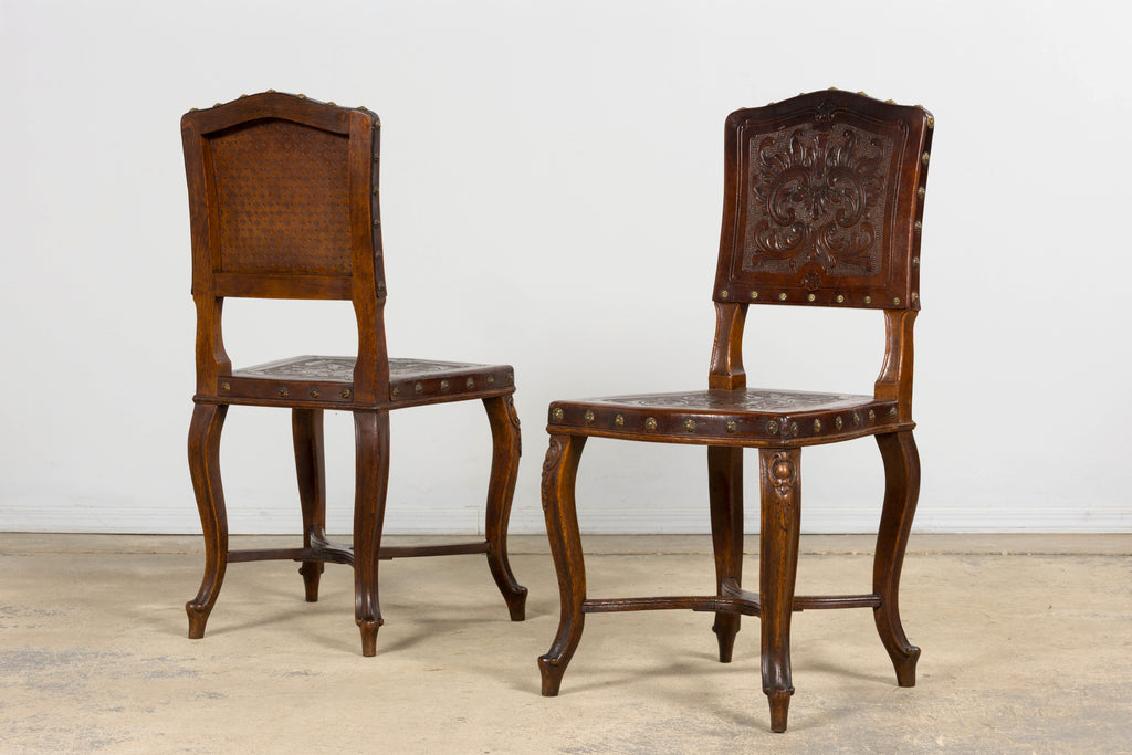 Set of 12 Late 19th Century French Renaissance Revival Carved Oak Dining Chairs with Embossed Leather
