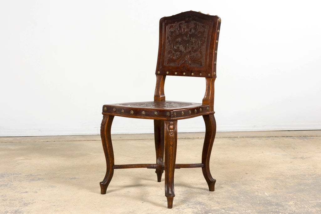 Set of 12 Late 19th Century French Renaissance Revival Carved Oak Dining Chairs with Embossed Leather