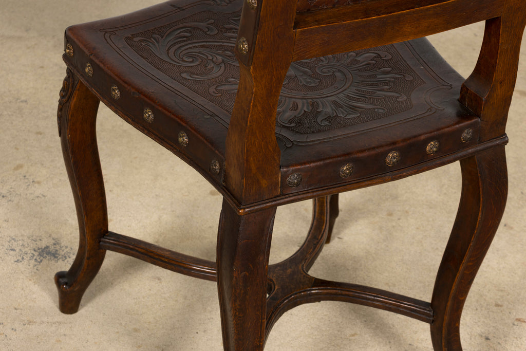 Set of 12 Late 19th Century French Renaissance Revival Carved Oak Dining Chairs with Embossed Leather