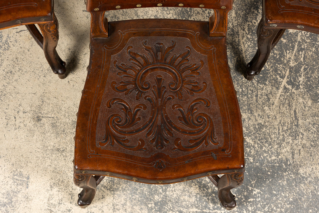 Set of 12 Late 19th Century French Renaissance Revival Carved Oak Dining Chairs with Embossed Leather