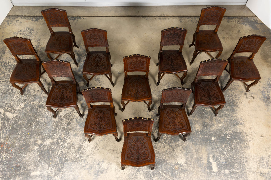 Set of 12 Late 19th Century French Renaissance Revival Carved Oak Dining Chairs with Embossed Leather