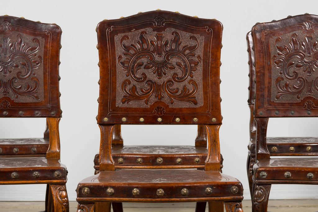 Set of 12 Late 19th Century French Renaissance Revival Carved Oak Dining Chairs with Embossed Leather