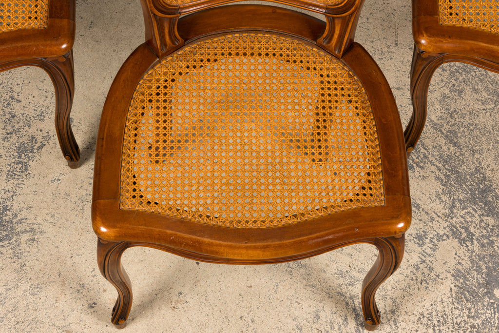 Set of 8 Early 20th Century French Louis XV Style Walnut Cane Dining Chairs