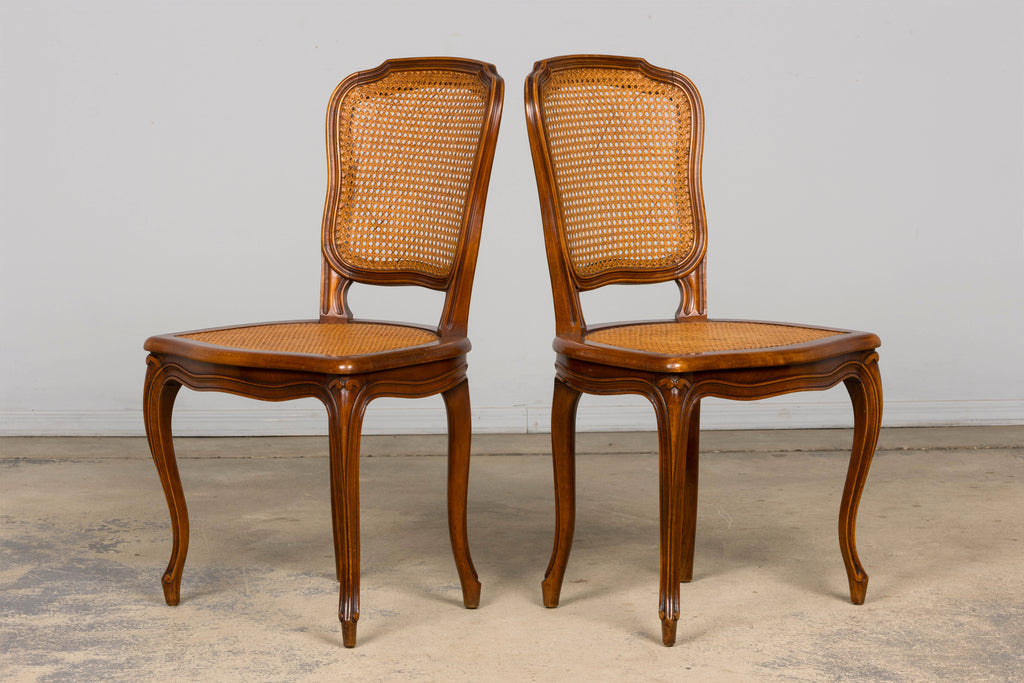 Set of 8 Early 20th Century French Louis XV Style Walnut Cane Dining Chairs