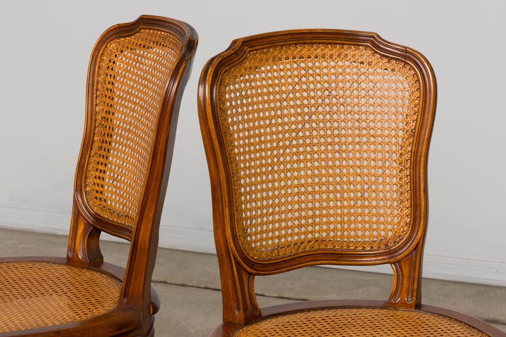 Set of 8 Early 20th Century French Louis XV Style Walnut Cane Dining Chairs