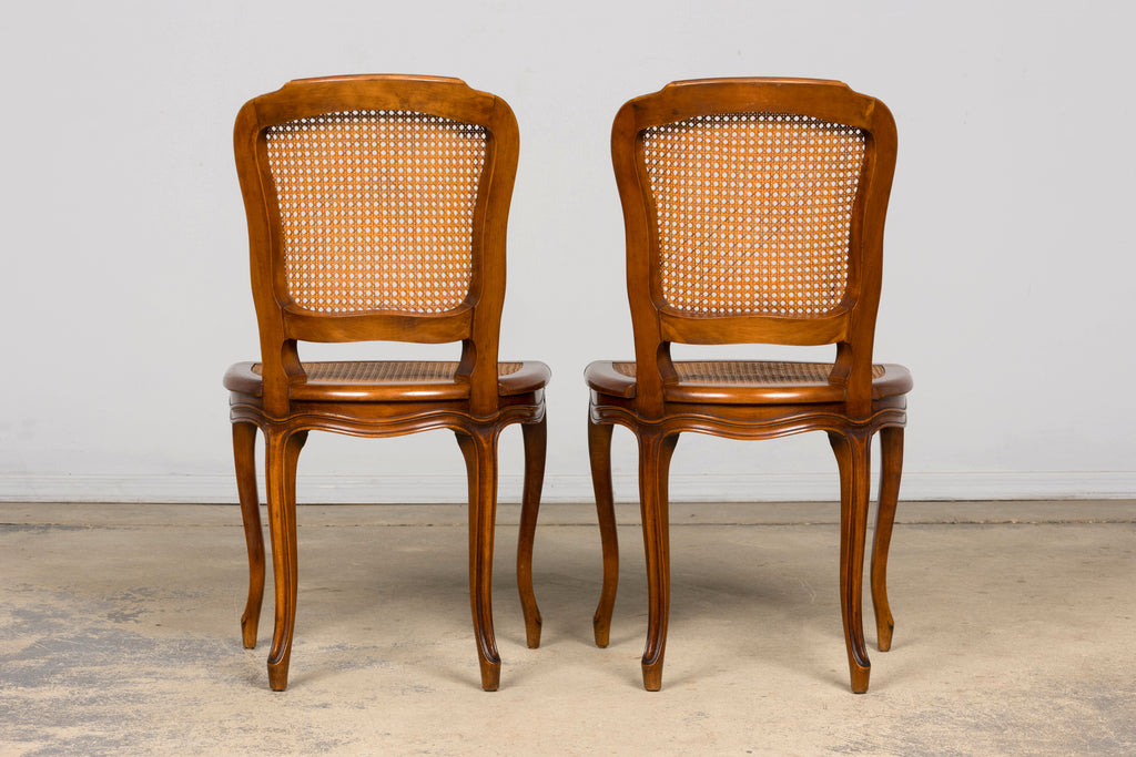 Set of 8 Early 20th Century French Louis XV Style Walnut Cane Dining Chairs