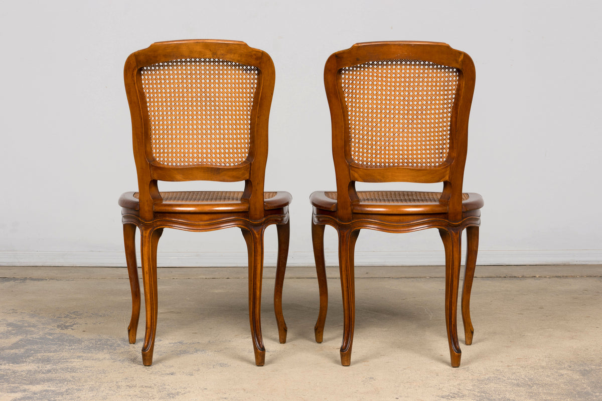 Set of 8 Early 20th Century French Louis XV Style Walnut Cane Dining Chairs