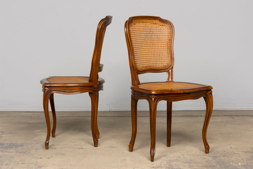 Set of 8 Early 20th Century French Louis XV Style Walnut Cane Dining Chairs