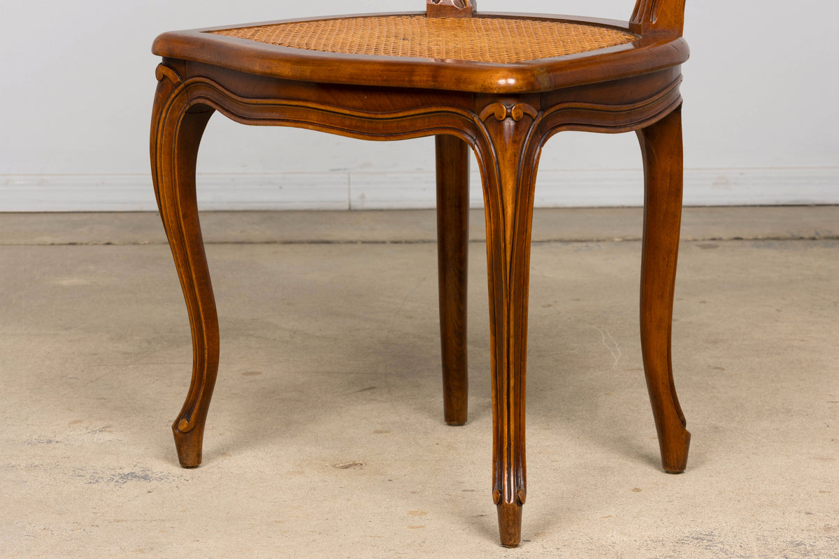 Set of 8 Early 20th Century French Louis XV Style Walnut Cane Dining Chairs