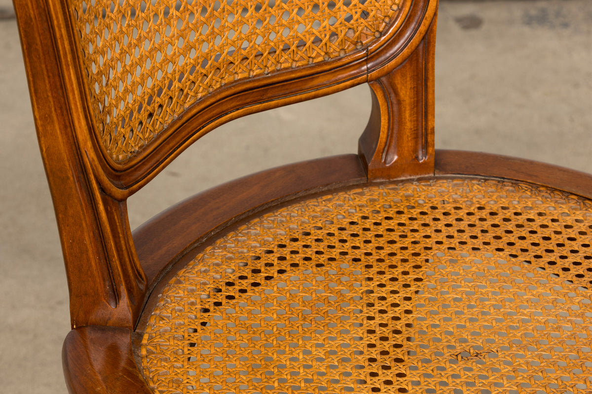 Set of 8 Early 20th Century French Louis XV Style Walnut Cane Dining Chairs