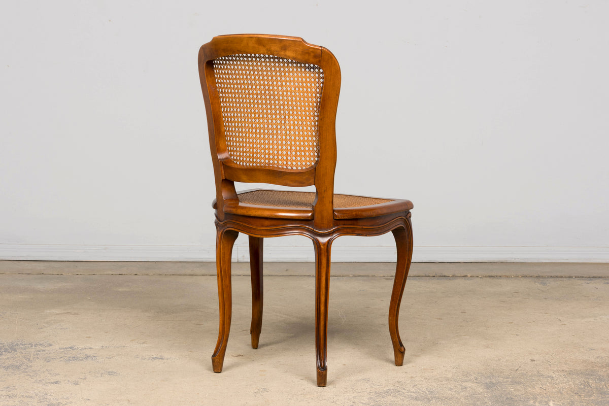 Set of 8 Early 20th Century French Louis XV Style Walnut Cane Dining Chairs