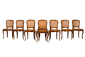 Set of 8 Early 20th Century French Louis XV Style Walnut Cane Dining Chairs
