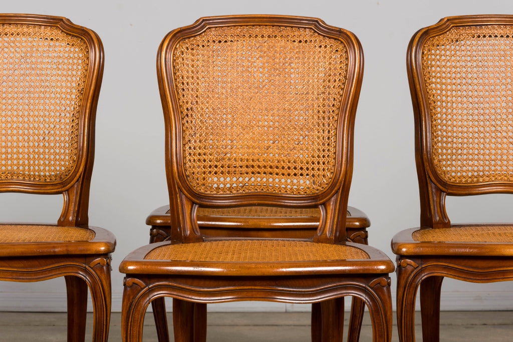 Set of 8 Early 20th Century French Louis XV Style Walnut Cane Dining Chairs