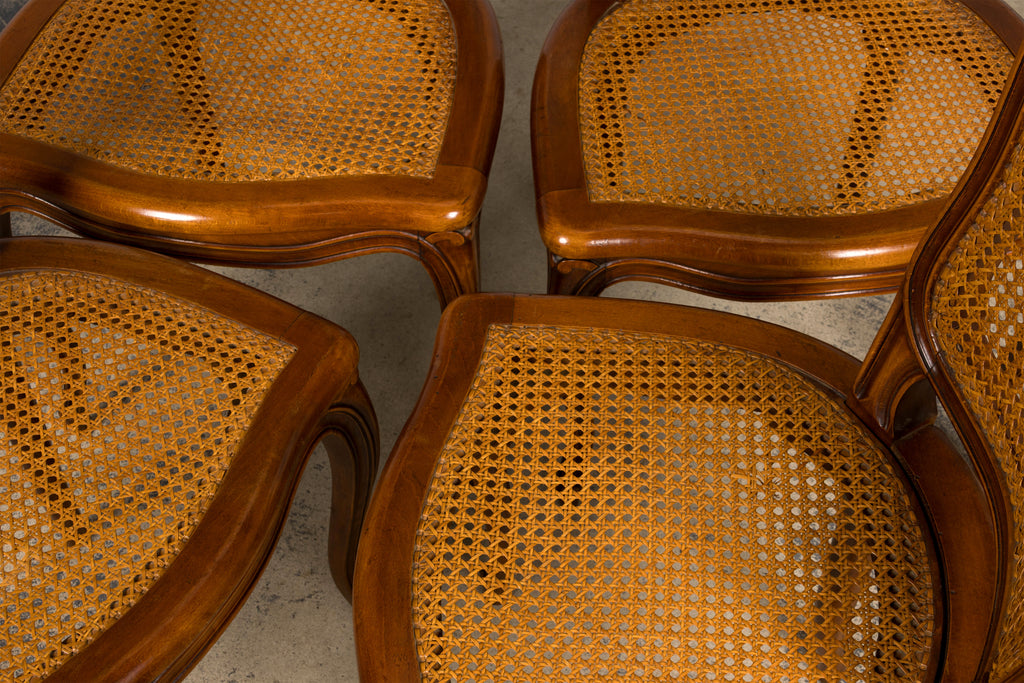 Set of 8 Early 20th Century French Louis XV Style Walnut Cane Dining Chairs