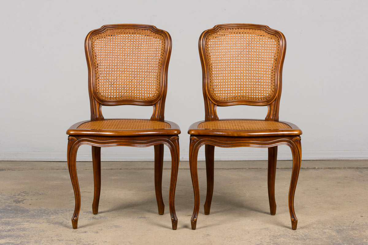 Set of 8 Early 20th Century French Louis XV Style Walnut Cane Dining Chairs