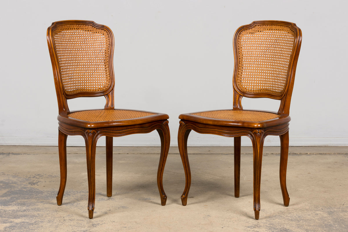 Set of 8 Early 20th Century French Louis XV Style Walnut Cane Dining Chairs