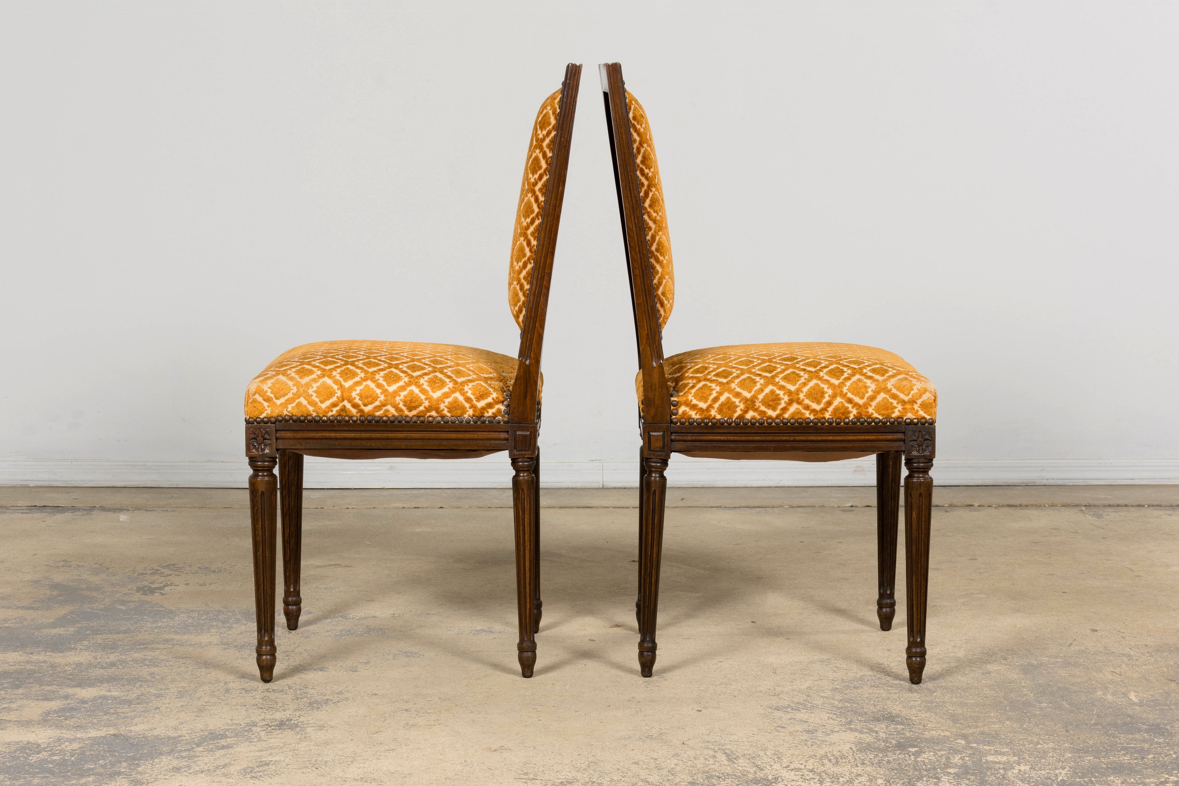 Set of Six Early 20th Century French Louis XVI Walnut Dining Chairs