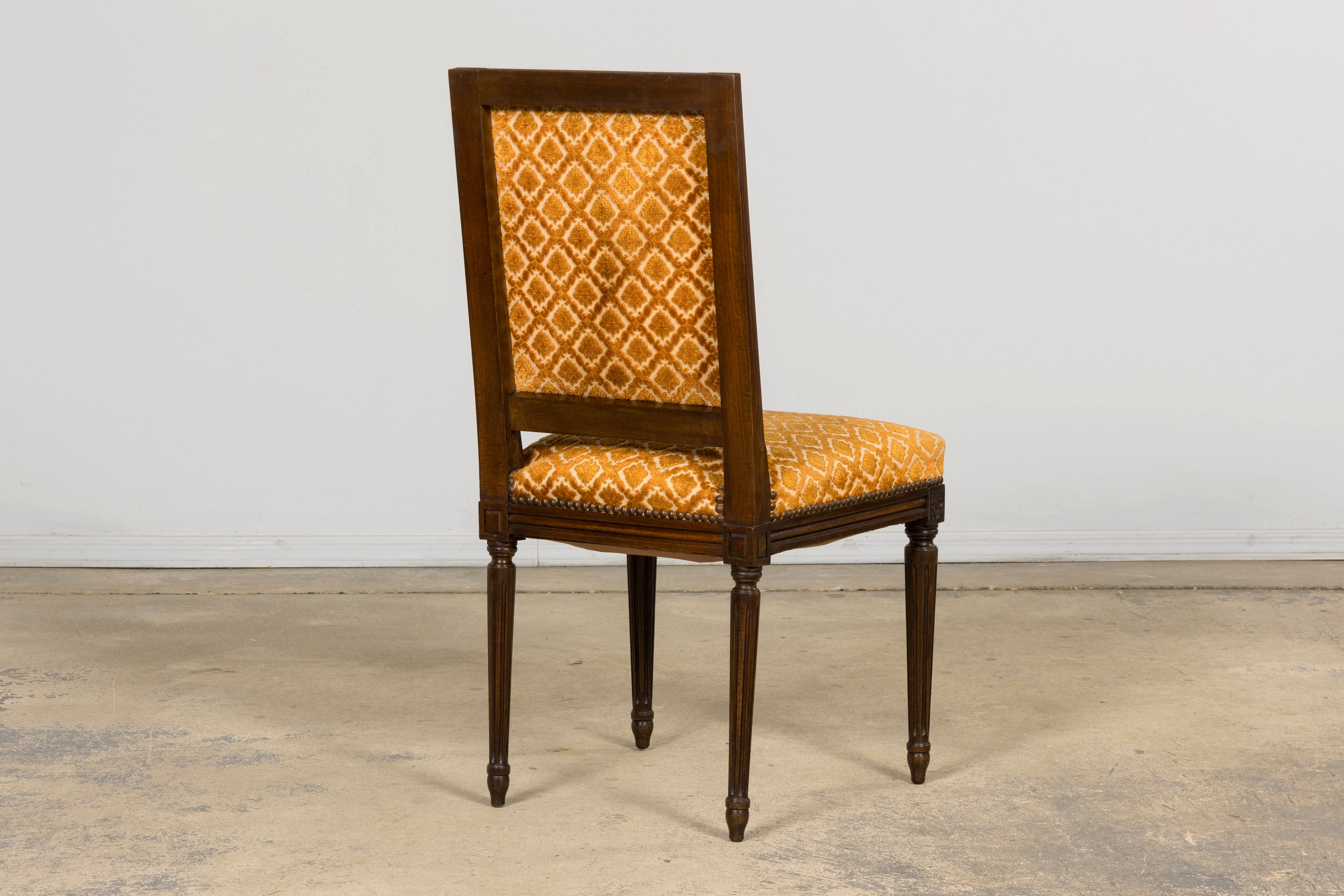 Set of Six Early 20th Century French Louis XVI Walnut Dining Chairs