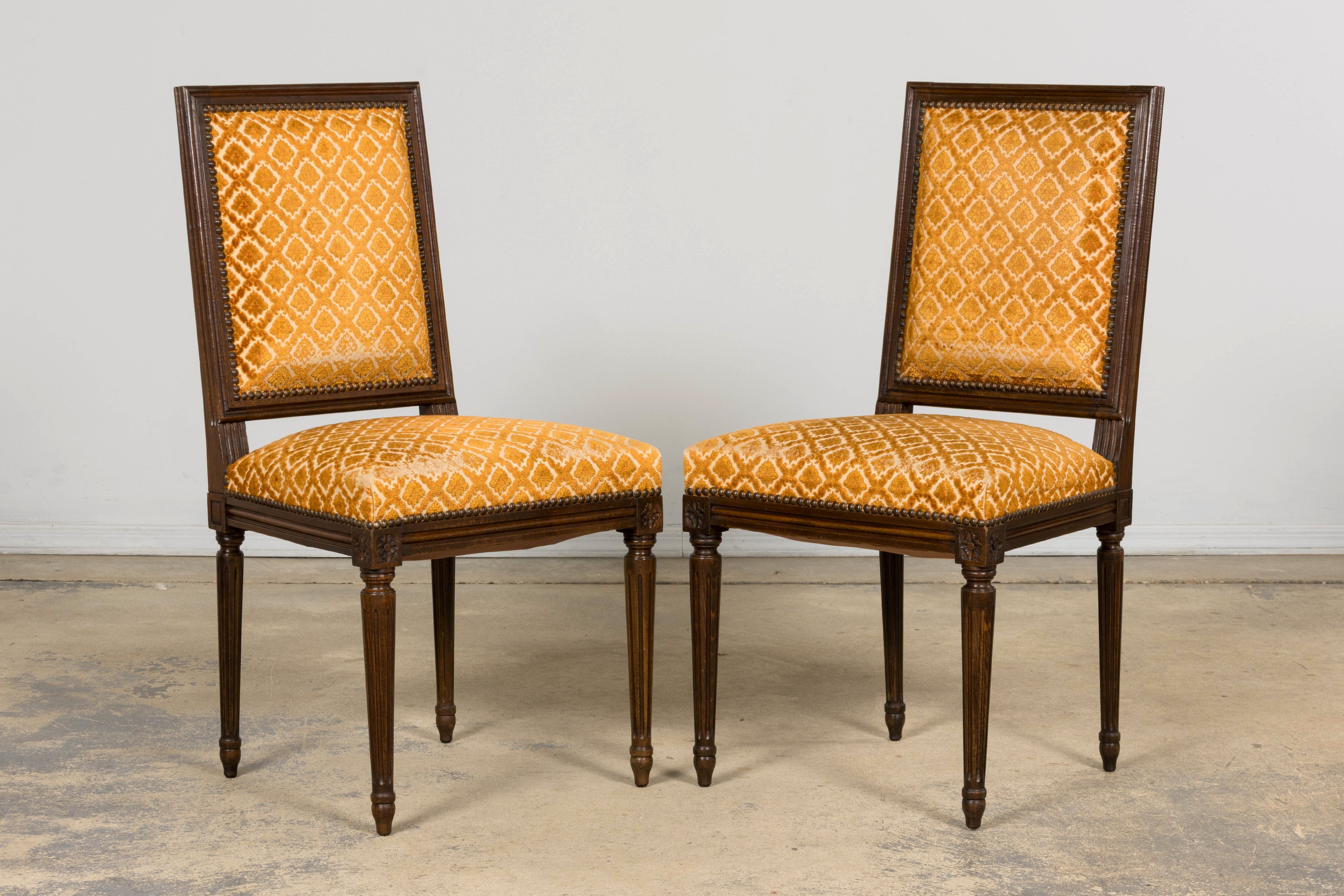 Set of Six Early 20th Century French Louis XVI Walnut Dining Chairs