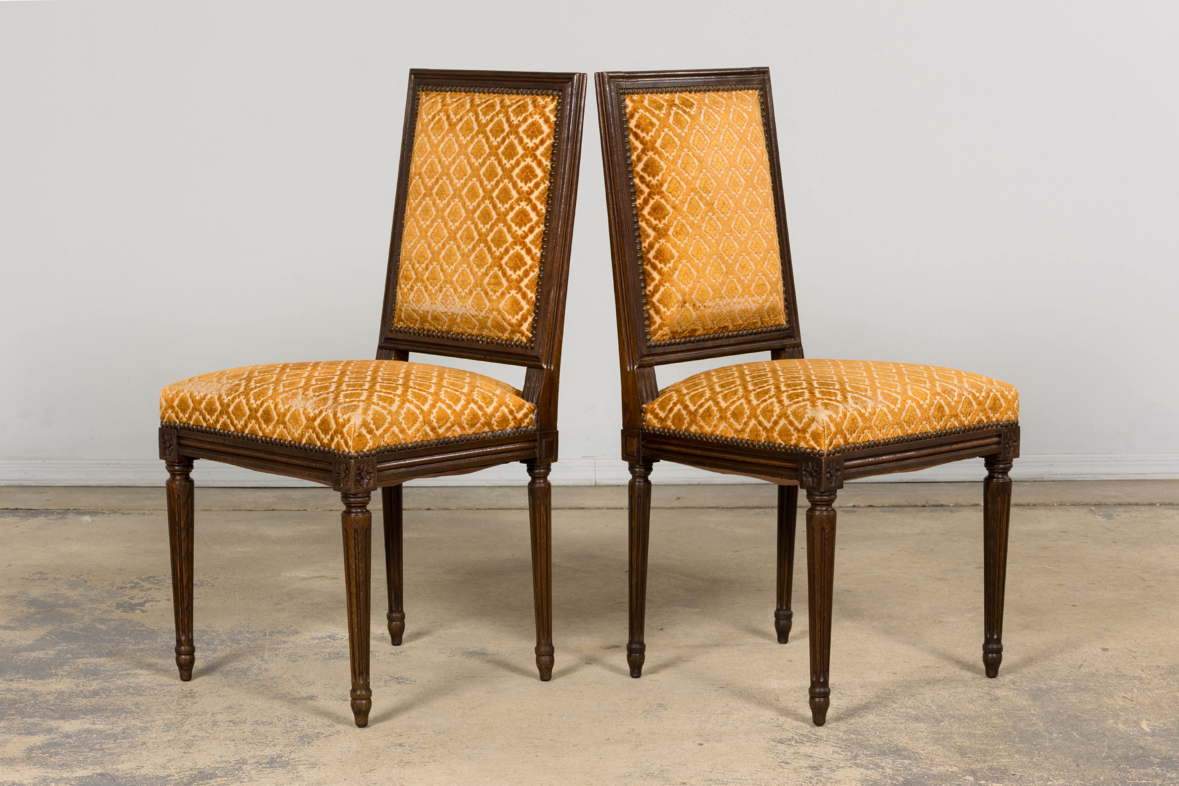 Set of Six Early 20th Century French Louis XVI Walnut Dining Chairs