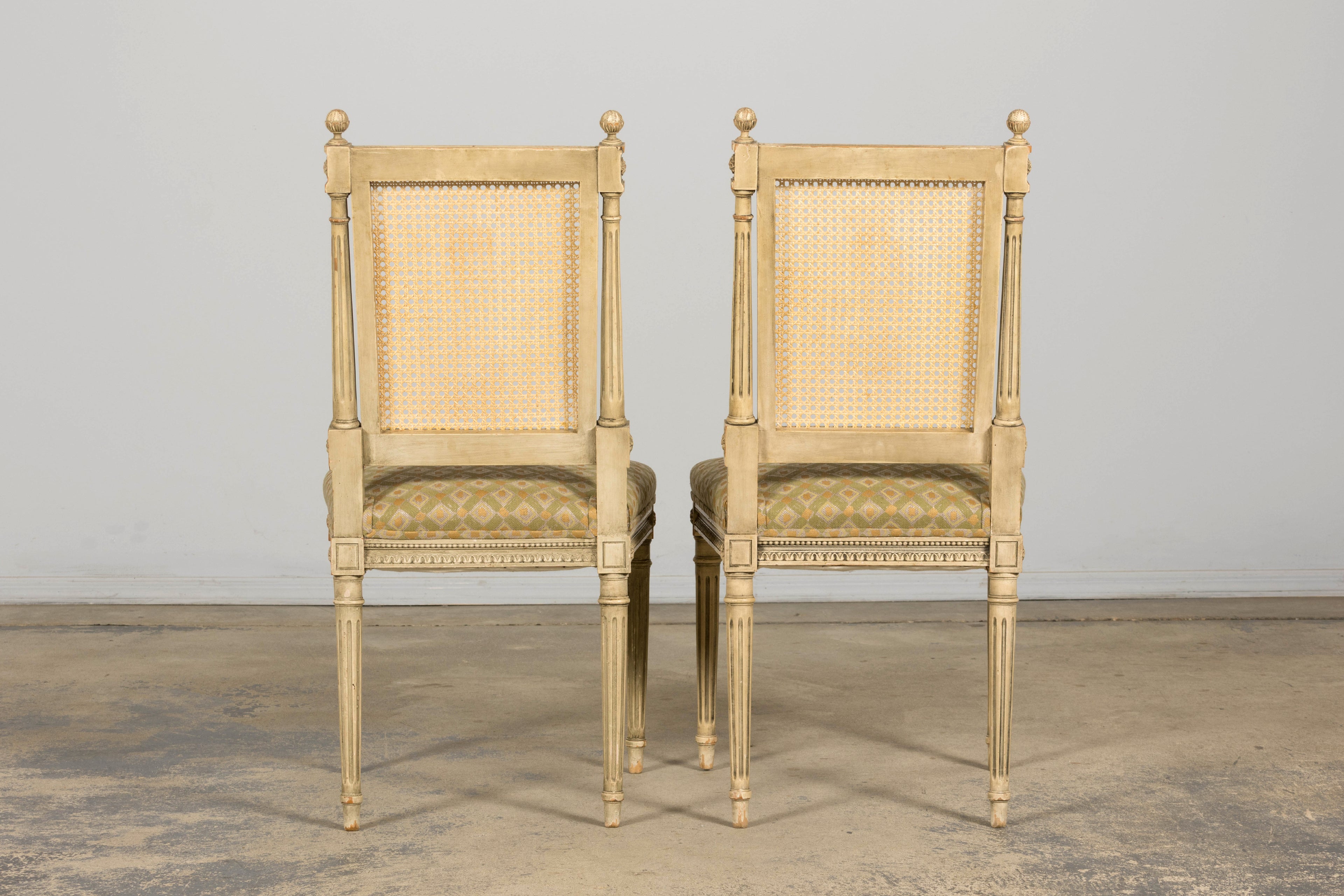 Set of Six Late 19th Century French Louis XVI Style Painted Cane Back Dining Chairs