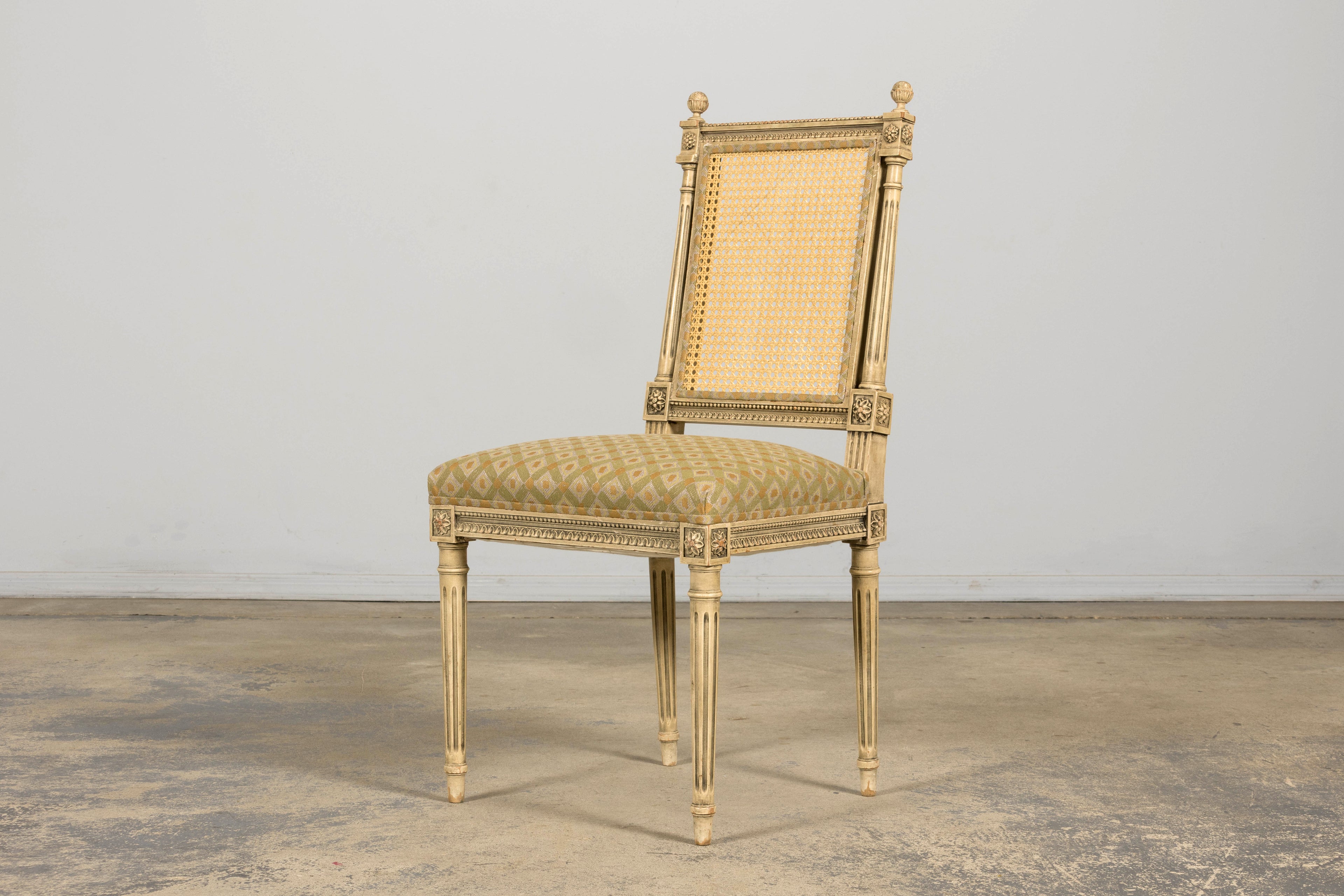 Set of Six Late 19th Century French Louis XVI Style Painted Cane Back Dining Chairs