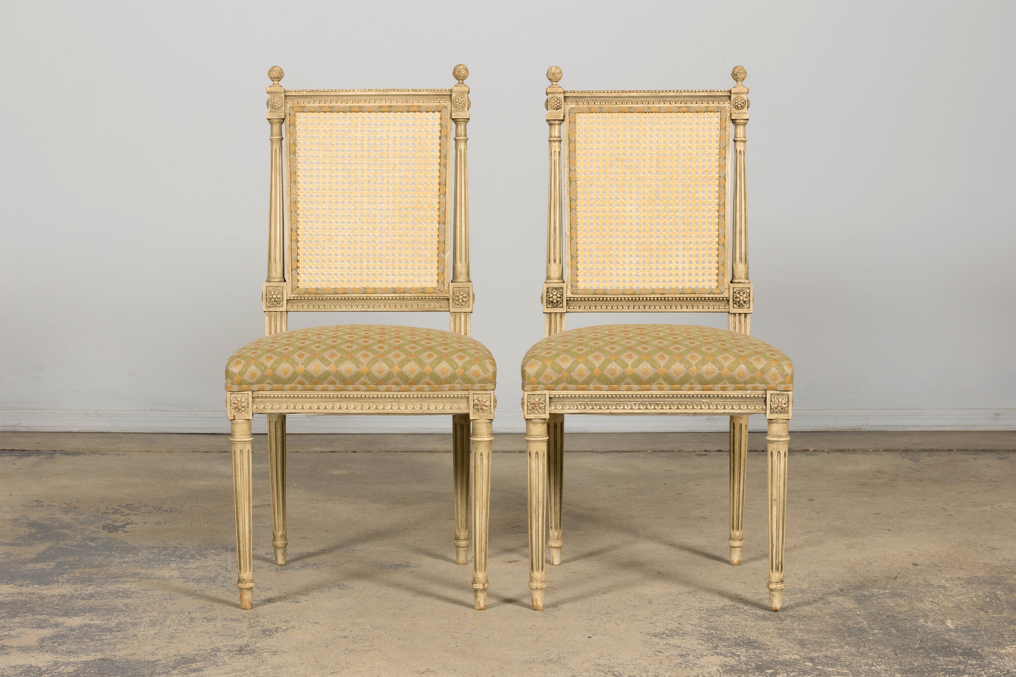 Set of Six Late 19th Century French Louis XVI Style Painted Cane Back Dining Chairs